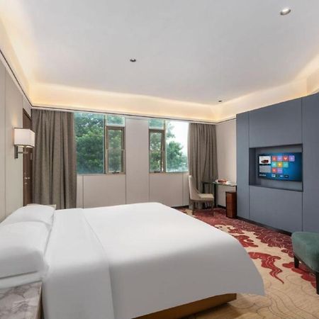 Heshan  Mizparton Hotel South Qianjin Road מראה חיצוני תמונה